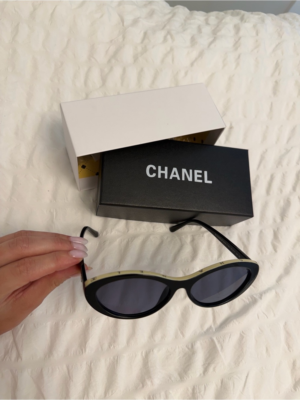 CHANEL Black and Ivory Cat-Eye Sunglasses with Dark Lenses